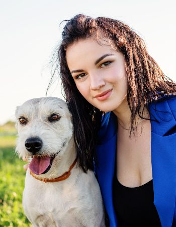 woman-hugging-her-dog-outdoors-2021-09-02-07-50-01-utc-1.jpg